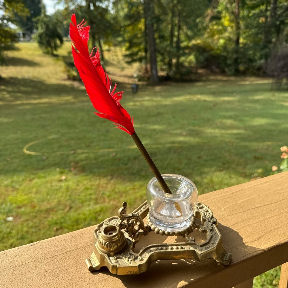 Elegant Brass Inkwell with Red Feather Quill